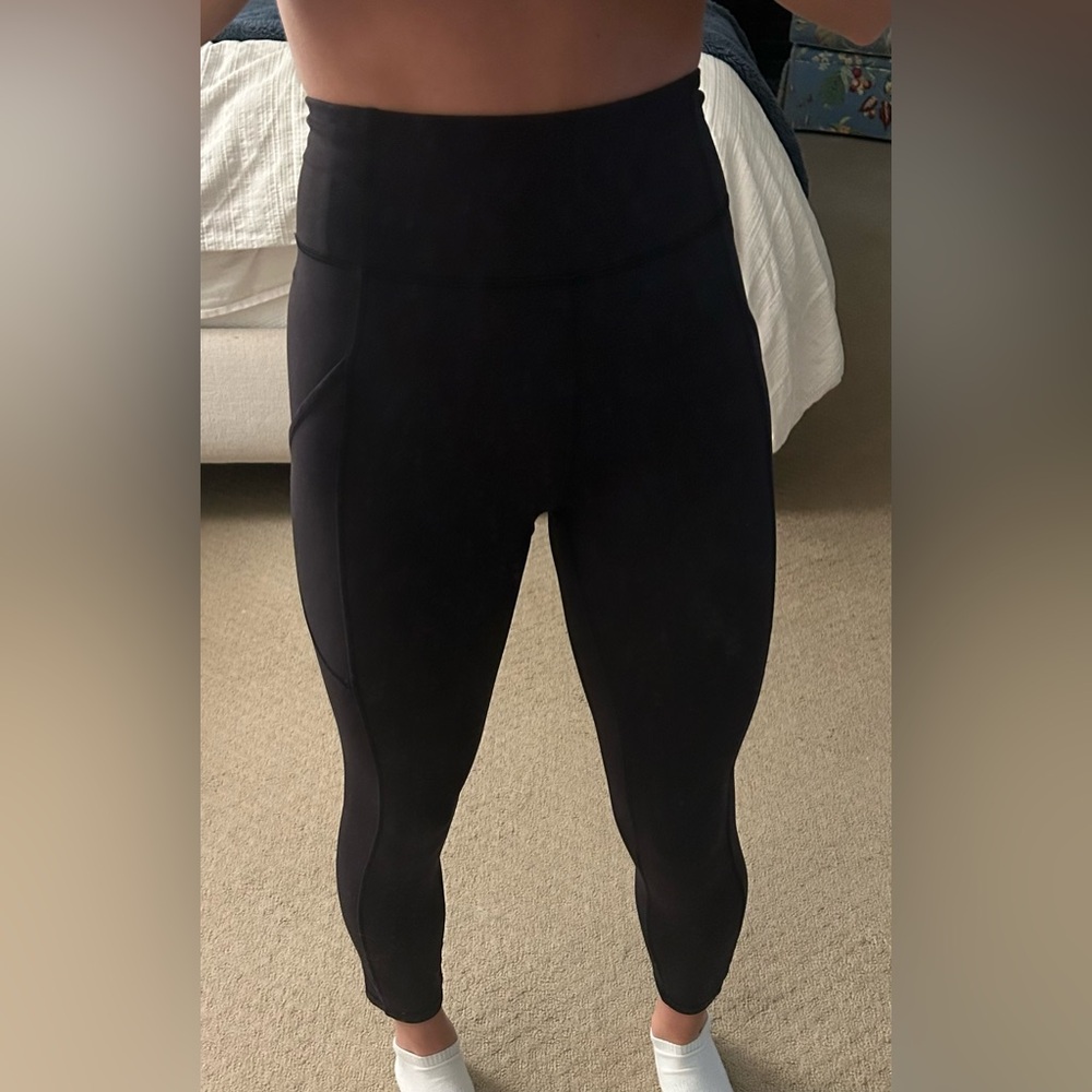 Black Lululemon leggings with side pockets